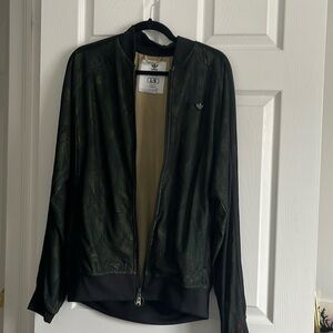 Adidas original Kazuki Kuraishi collab green with a lace overlay